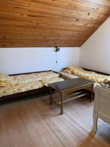 Postel nebo postele na pokoji v ubytování Vila Lane