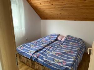 Postel nebo postele na pokoji v ubytování Vila Lane