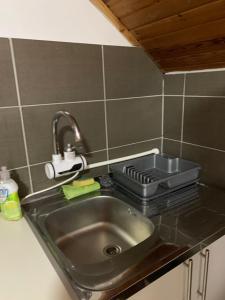 Kuchyň nebo kuchyňský kout v ubytování Vila Lane + 34 fotografií
