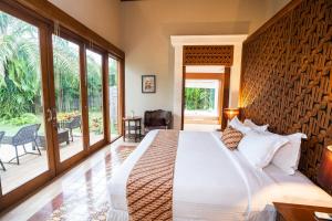 Katil atau katil-katil dalam bilik di Abhayagiri - Sumberwatu Heritage Resort