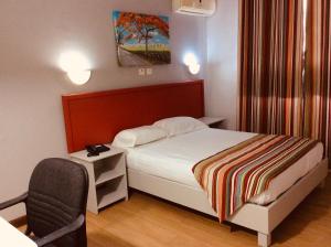 Postelja oz. postelje v sobi nastanitve Champ de Mars B&B