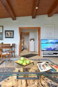 Televízia a/alebo spoločenská miestnosť v ubytovaní La Casa de Arriba Arucas by VillaGranCanaria