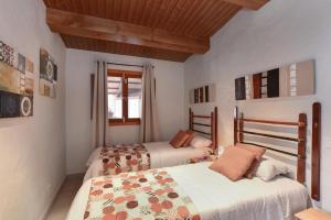 Posteľ alebo postele v izbe v ubytovaní La Casa de Arriba Arucas by VillaGranCanaria