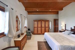 Posteľ alebo postele v izbe v ubytovaní La Casa de Arriba Arucas by VillaGranCanaria