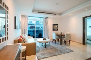 A seating area at HiGuests - Spacious 1BR in Dubai Marina With Amazing Views