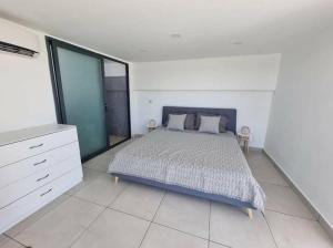 Letto o letti in una camera di Penthouse vue sur mer 200m2