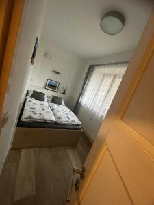 Postel nebo postele na pokoji v ubytování Rocky Apartment