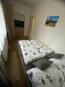 Postel nebo postele na pokoji v ubytování Rocky Apartment