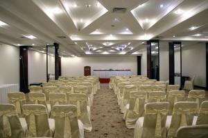 a room with a row of chairs in a hall at Hotel Hillview Islamabad in Islamabad