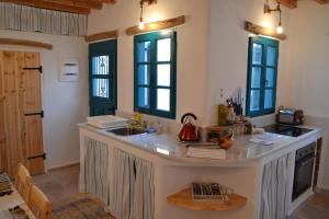Kuchyň nebo kuchyňský kout v ubytování Shirleys Cottage + 24 fotografií