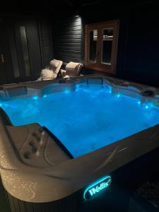 a jacuzzi tub in a hotel room at Chalet Mint in Delnice
