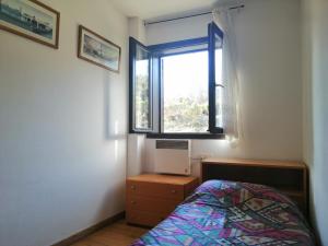 Postel nebo postele na pokoji v ubytování Apartamento Besiberri 3 situado en una planta baja y con terraza