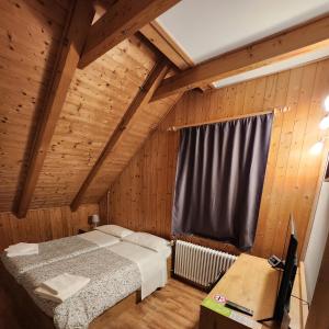 Posteľ alebo postele v izbe v ubytovaní Hotel Tarvisio Four Seasons