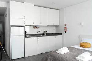 Η κουζίνα ή μικρή κουζίνα στο Almada Downtown 401