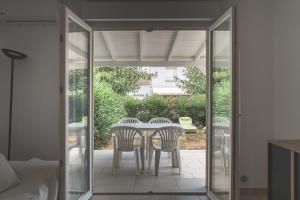 Posedenie v ubytovaní Maison à Cervione Prunete jardin piscine accès direct plage + 10 fotografií