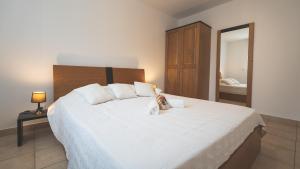 Posteľ alebo postele v izbe v ubytovaní Maison à Cervione Prunete jardin piscine accès direct plage
