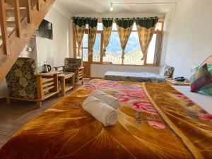 Voodi või voodid majutusasutuse Hotel BHRIGU toas