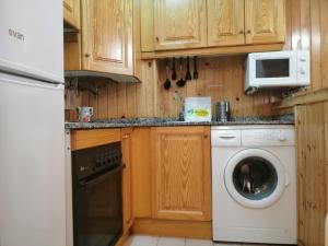 Kuchyň nebo kuchyňský kout v ubytování Apartamento Besiberri 3 situado en una planta baja y con terraza