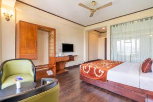 Ένα ή περισσότερα κρεβάτια σε δωμάτιο στο Summit Lillium Hotel & Spa