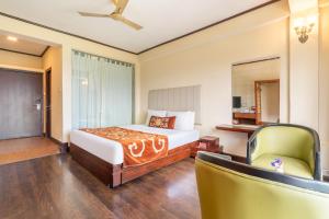 Ένα ή περισσότερα κρεβάτια σε δωμάτιο στο Summit Lillium Hotel & Spa