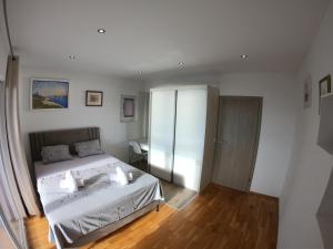 Postel nebo postele na pokoji v ubytování VILLA VIS MARIS