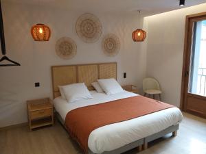 Posteľ alebo postele v izbe v ubytovaní Intense Boutik-Hôtel