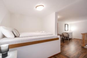 Posteľ alebo postele v izbe v ubytovaní Innova Vision Apartment