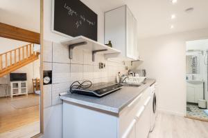 Kuchyňa alebo kuchynka v ubytovaní Innova Vision Apartment