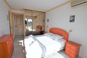 Posteľ alebo postele v izbe v ubytovaní Appartement 80 m2 au centre-ville de Cannes