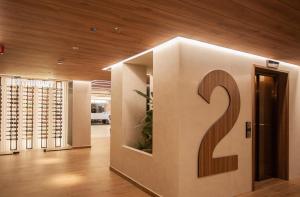 a building with a sign that says the number two at Hotel Primavera Park in Benidorm