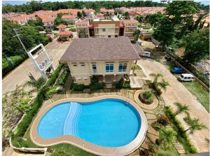 an overhead view of a house with a swimming pool at CONDO unit in Puerto Princesa Palawan in Puerto Princesa City