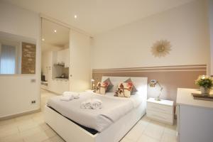 Uma cama ou camas num quarto em Truly Verona