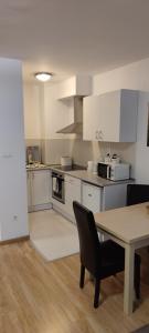 Kuchyň nebo kuchyňský kout v ubytování Prince Apartments