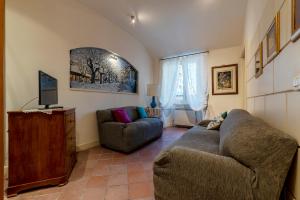 A seating area at Castel Sant'Angelo Cozy Apartment