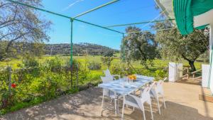 A garden outside Casa rural el Tejar Higuera de la Sierra by Ruralidays
