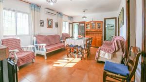 A seating area at Casa rural el Tejar Higuera de la Sierra by Ruralidays