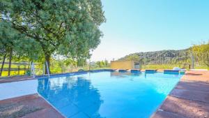 The swimming pool at or close to Casa rural el Tejar Higuera de la Sierra by Ruralidays