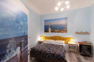 Postel nebo postele na pokoji v ubytování Rooms Boutique Carducci