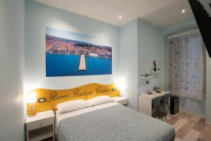 Postel nebo postele na pokoji v ubytování Rooms Boutique Carducci