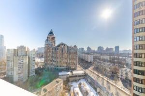 an aerial view of a city with tall buildings at 16141 Jack House Panoramic city view in Kyiv