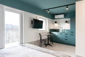 Łóżko lub łóżka w pokoju w obiekcie Odra Apartments
