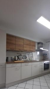 Η κουζίνα ή μικρή κουζίνα στο Ferienwohnung Windhagen