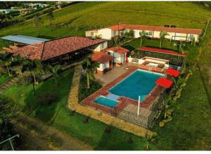 an aerial view of a house with a swimming pool at Altamira Biohotel in Socorro