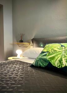 A bed or beds in a room at La Sosta in Toscana