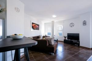 TV a/nebo společenská místnost v ubytování 404 Colina Blanca Vista al Mar y WIFI