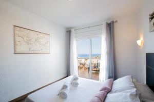 Postel nebo postele na pokoji v ubytování 404 Colina Blanca Vista al Mar y WIFI