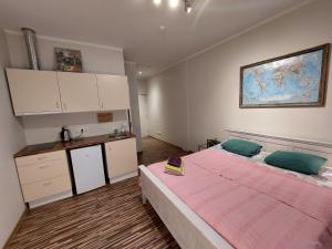Postel nebo postele na pokoji v ubytování Looming Hostel