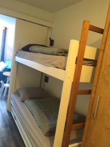 Postel nebo postele na pokoji v ubytování Studio 1 cabine chalet club III refait à neuf
