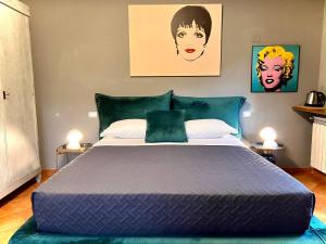 A bed or beds in a room at La Sosta in Toscana