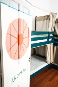 a bunk bed room with a basketball on the door at Tamaran House in Las Palmas de Gran Canaria